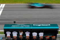Sebastian Vettel, Aston Martin AMR21, passes the Aston Martin pit wall