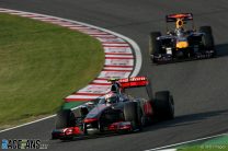Button holds back Alonso and Vettel for Japanese Grand Prix win
