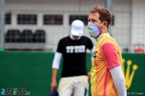 Vettel and three others reprimanded for wearing T-shirts during national anthem